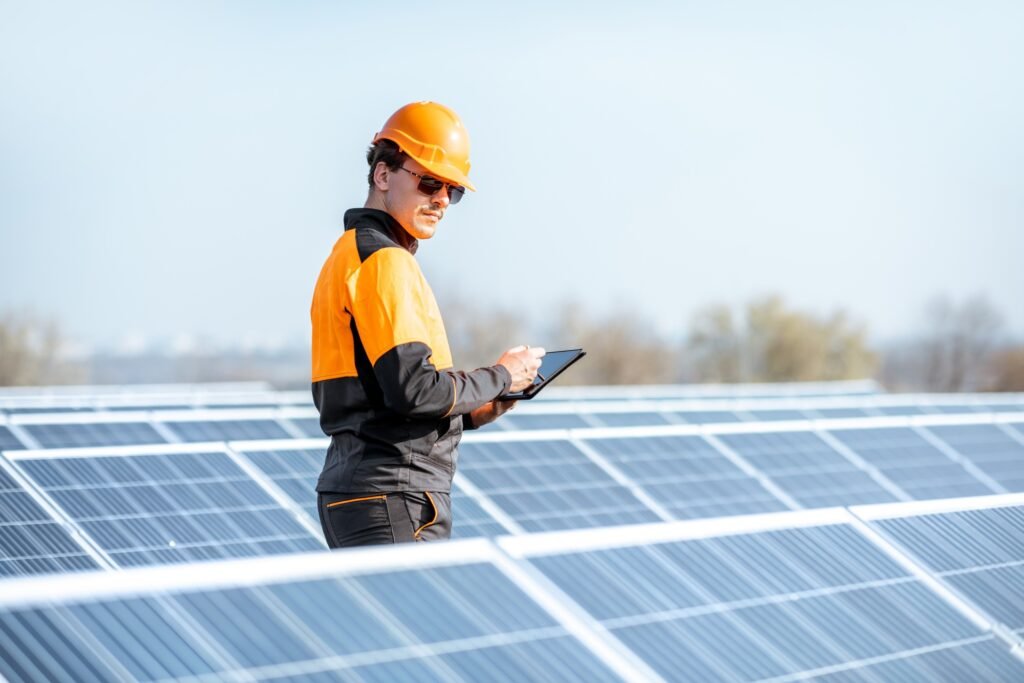 What is Solar Energy and How Does it Works 1 Engineer servicing solar panel on electric plant